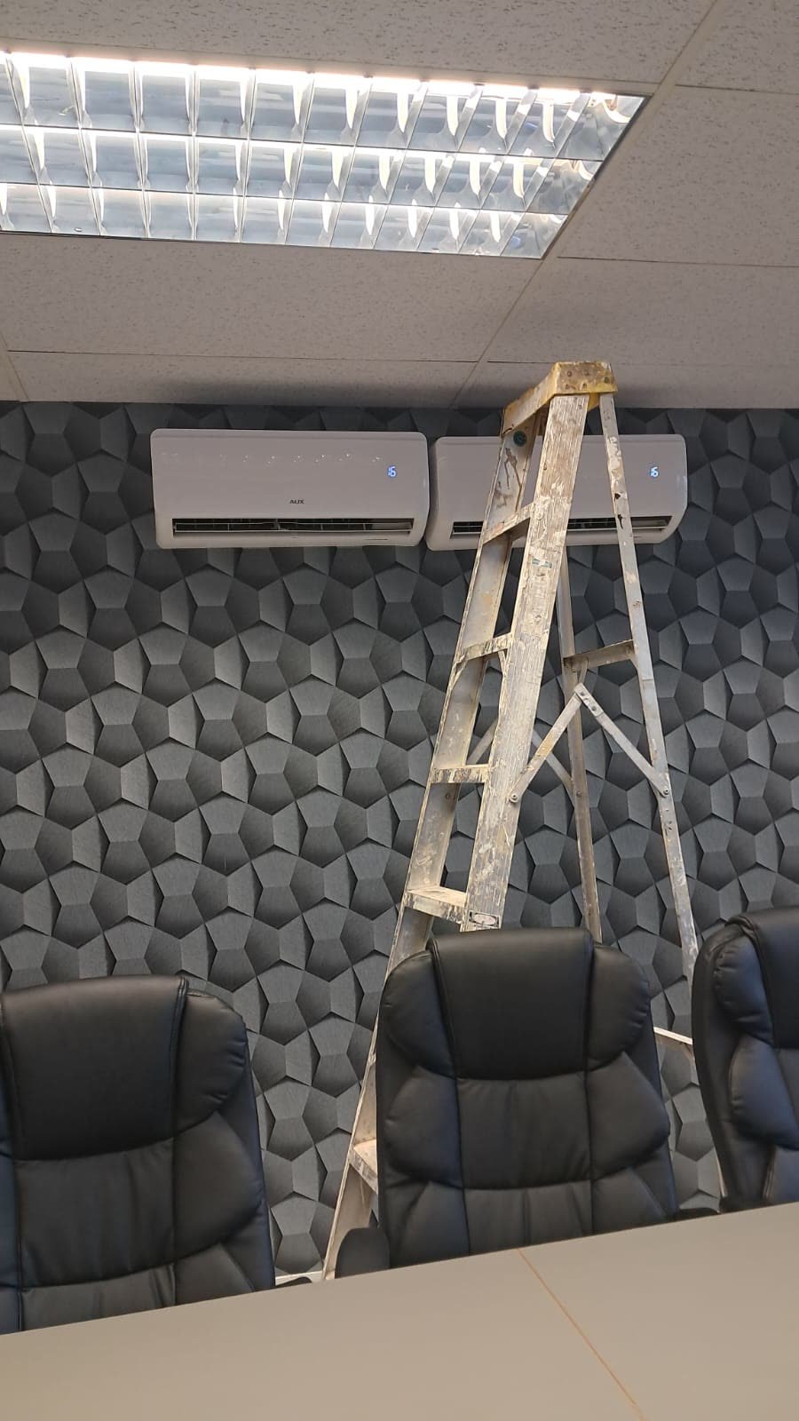 Twin split units in a boardroom
